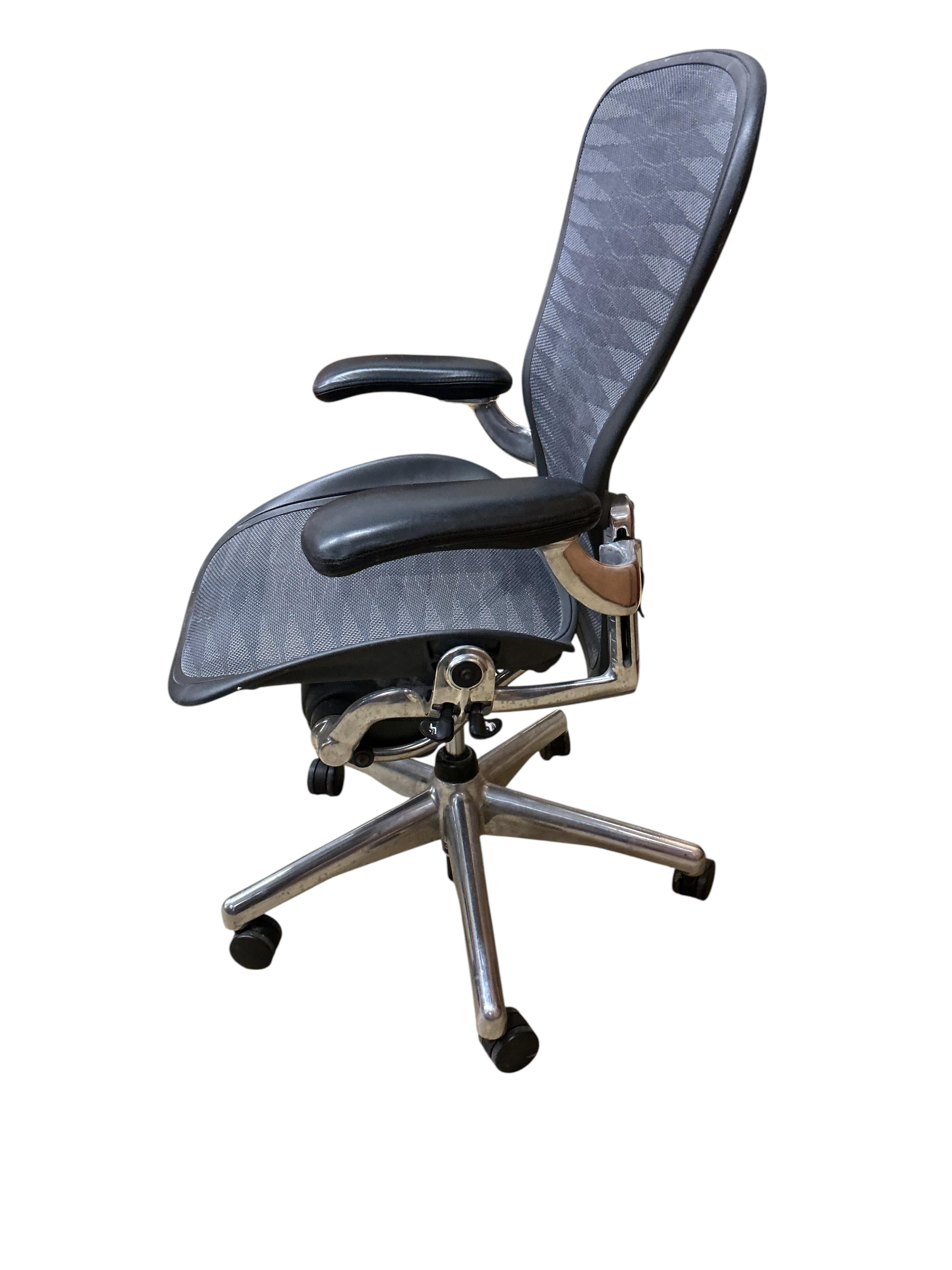 A Herman Miller Aeron desk chair, width 66cm, depth 50cm, height 104cm